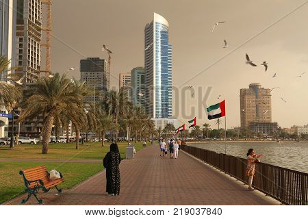 Sharjah Uae - December 10 2017: People Visit The Waterfront In Sharjah Uae. This Third Populous City