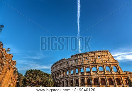 World famous Coliseum at sunset in Rome Italy