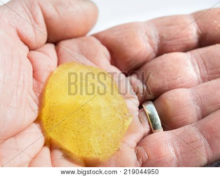 Microbead hand cleaner in palm of a hand