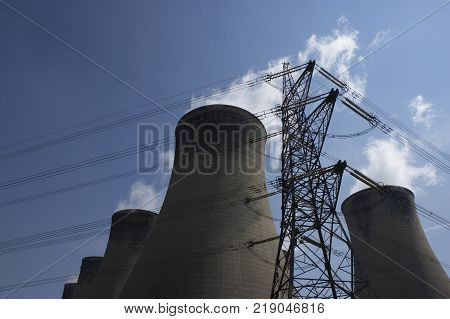 Electricity Pylon And Cooling Towers In Silhouette Eggborough Power Station Yorkshire England