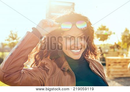 Portrait of a smiling happy woman having fun
