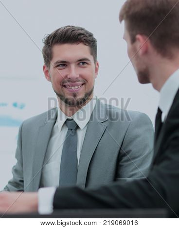 Business people at work. Two business people in formalwear discu