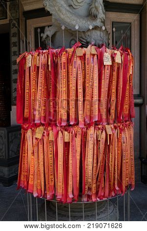  Yokohama - Japan, June 16, 2017; Red ribbons with prayers and wishes at the Chinese Mazu Miao Temple in China town in Yokohama city 