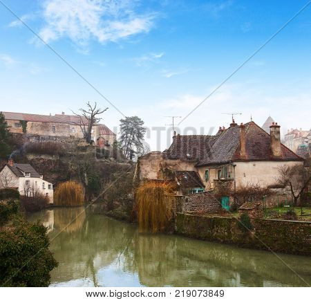 Old houses on the river Armancon, Semur-en-Auxois, eastern France.