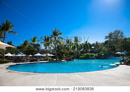 MARIBAGO, MACTAN ISLAND, PHILIPPINES - MARCH 24, 2016: Guests at the Imperial Palace Waterpark Resort and Spa on March 24, 2016. Philippines.