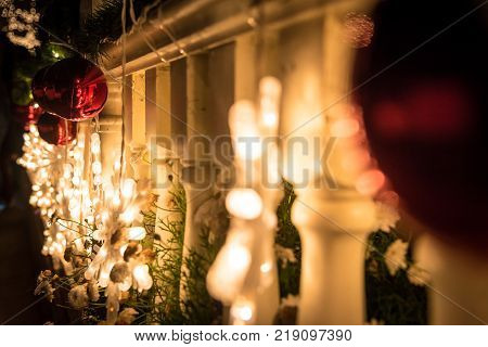 Lghting Christmas tree toys on the balustrade in the Christmas night