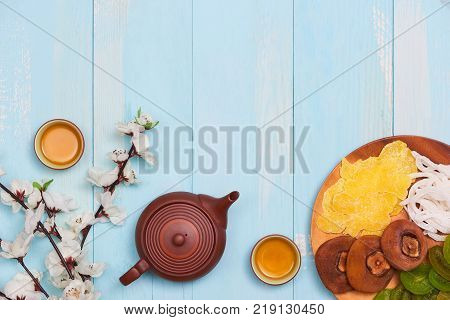 Top View Accessories Chinese New Year Festival Decorations.orange,leaf On Blue Background