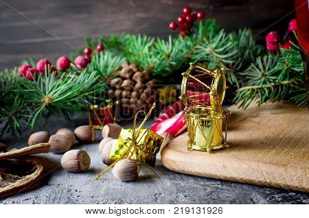 Red Christmas  Gift  Box With Red Ribbon And Fir Branches