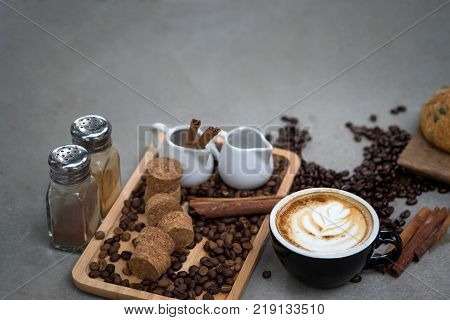 Morning coffeeLatte coffee in cup on tablevintage tone.
