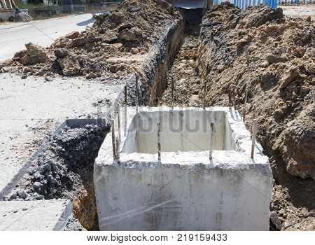 Concrete manhole is underconstruction; for draining storm water.