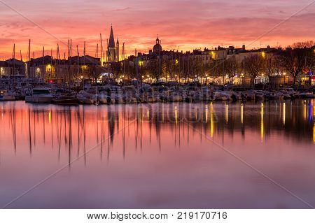 Harbor by night with beautiful sunset in La Rochelle Town