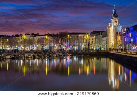 Harbor by night with beautiful sunset in La Rochelle Town