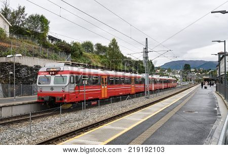 VOSS, NORWAY - 21 SEPTEMBER 2017: Passengers wait on the platform at the Voss railway station in Norway