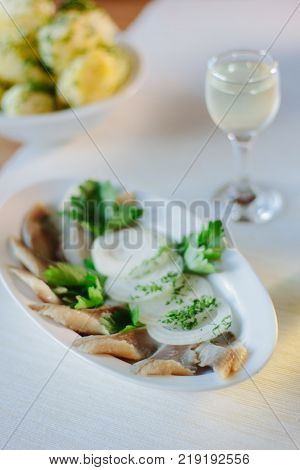 Salty herring on restaurant table - nice food.