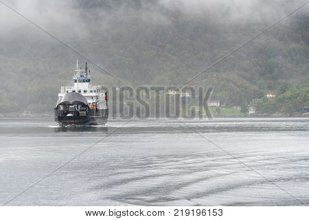 STAVANGER, NORWAY - SEPTEMBER 20, 2017: MS Stord car ferry crosses the fjord outside Stavanger in Norway