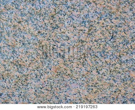 Natural stone red granite texture background. Bright hard red granite texture. Red granite texture stone background. Red granite texture untreated surface. Facing material horizontal background.