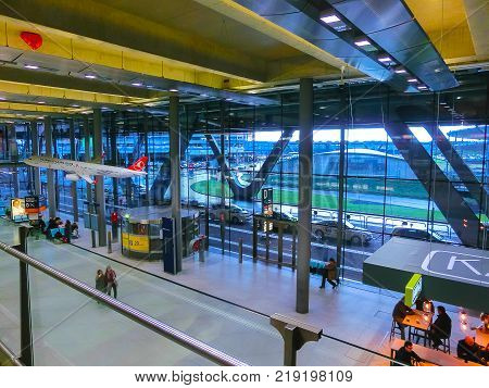 Cologne, Germany - December 12, 2017: The people going at Cologne Bonn Airport at Cologne, Germany on December 12, 2017.