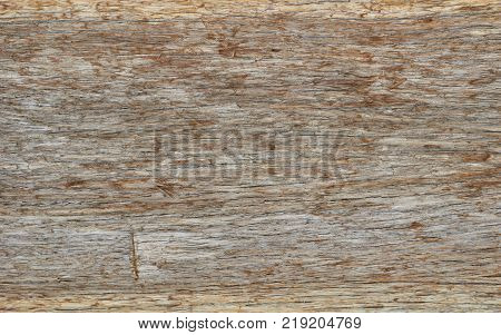 Dark wood texture background surface with old natural pattern or dark wood texture table top view. Grunge surface with wood texture background. Vintage timber texture background. Rustic table top view