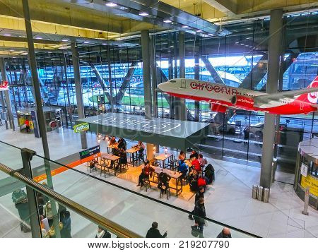 Cologne, Germany - December 12, 2017: The people going at Cologne Bonn Airport at Cologne, Germany on December 12, 2017.