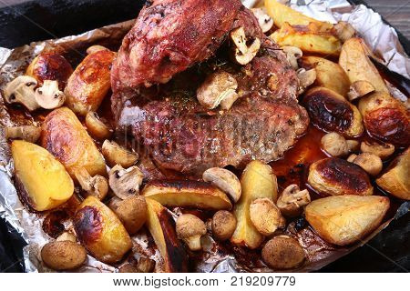 Grilled pork meat with potatoes. barbecue. Selective focus