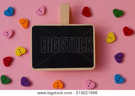 Valentine's day background close up. Heart-shaped buttons with a copy space.