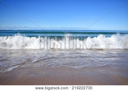 A wave at a tropical beach in Australia