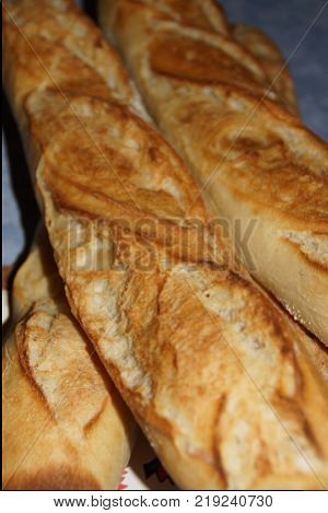 A baguette either simply baguette, so called baguette of Paris, or still French loaf, but also bread baguette is a variety of bread, recognizable in its lengthened (stretched out) shape. Even if this shape of bread is symbolic of France, the baguette is a