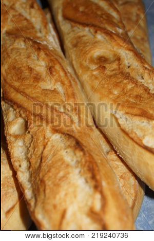 A baguette either simply baguette, so called baguette of Paris, or still French loaf, but also bread baguette is a variety of bread, recognizable in its lengthened (stretched out) shape. Even if this shape of bread is symbolic of France, the baguette is a