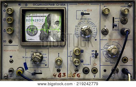 Dollar banknote on the screen of an old oscilloscope