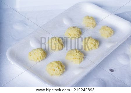 Frozen Grated Ginger in the freezer. Freezing food.