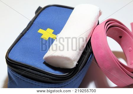 First aid kit for first aid in case of trauma tourniquet for stopping bleeding bandage for bandaging.
