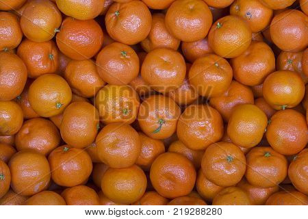 Fresh orange tangerine fruit mandarin background high vitamin C good for health top view close up