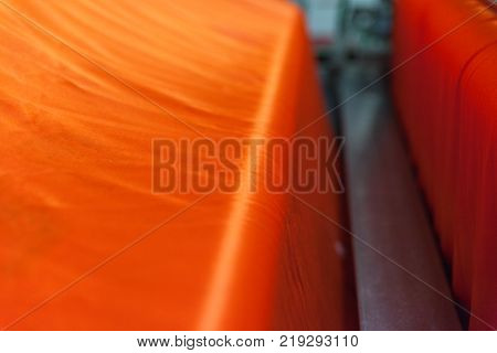 orange raw cotton in factorycotton yarn in a textile mill.