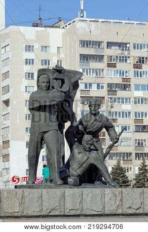 Nizhny Novgorod, Russia. - March 14.2017. The sculptural group is a worker, a soldier and a collective farmer near the pedestal with Vladimir Ilyich Lenin at the top
