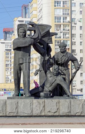 Nizhny Novgorod, Russia. - March 14.2017. The sculptural group is a worker, a soldier and a collective farmer near the pedestal with Vladimir Ilyich Lenin at the top