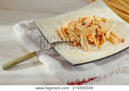 Yuba or fuju salad in a white bamboo plate