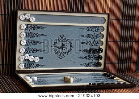 Backgammon opened mini table game for journey