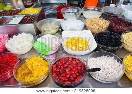 Sweet fruits for sale at market in Chinatown, Bangkok, Thailand