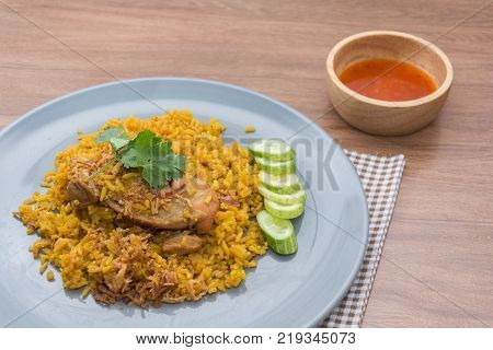 Chicken Biryani with rice and sauce. halal food (Khao Mok Gai)