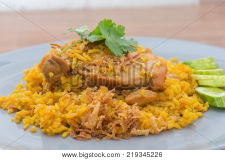 Chicken Biryani with rice and sauce. halal food (Khao Mok Gai)