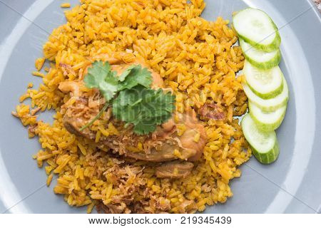 Chicken Biryani with rice and sauce. halal food (Khao Mok Gai)