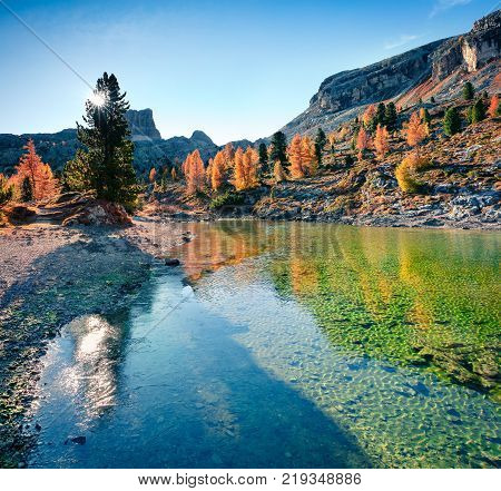 Splendid view of Limides Lake. Colorful autumn morning in Dolomite Alps Falzarego pass Cortina d'Ampezzo lacattion Italy Europe. Artistic style post processed photo.
