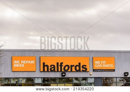 Northampton UK October 29, 2017: Halfords logo sign in Northampton town centre.