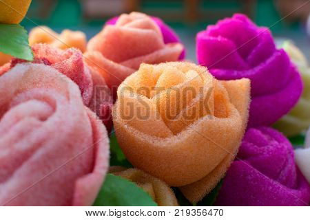 spongewood made artificial colored flowers handicrafts on display in Handicraft Fair in Kolkata - the biggest handicrafts fair in Asia.