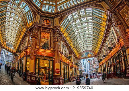 LONDON ENGLAND - NOVEMBER 27 2017: Inside of the Leadenhall market with covered roof and shopping arcade one of the oldest markets in London dating back to the 14th century.