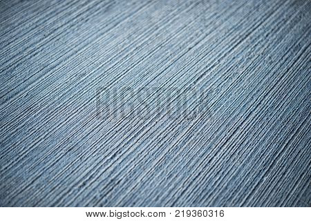 Concrete blue abstract background with lined texture