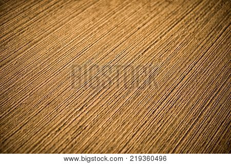 Concrete gold abstract background with lined texture
