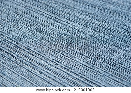 Concrete blue abstract background with lined texture