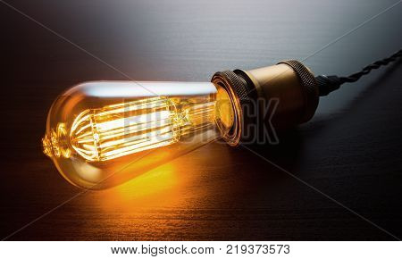 Retro Vintage Edison Bulb On A Table