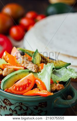 Vegetarian variant of mexican fachitos on wooden board.